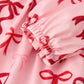 Pink Bow Print Girls Dress with Ruffle Hem