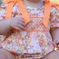 Peach Bow Smocked Floral Baby Bubble