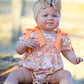 Peach Bow Smocked Floral Baby Bubble