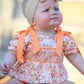 Peach Bow Smocked Floral Baby Bubble